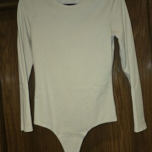 nuuds Cream Long Sleeve Slinkyrib Bodysuit